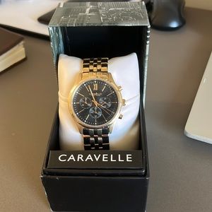 Brand new in box Caravelle men’s gold watch (plastic still on watch face)